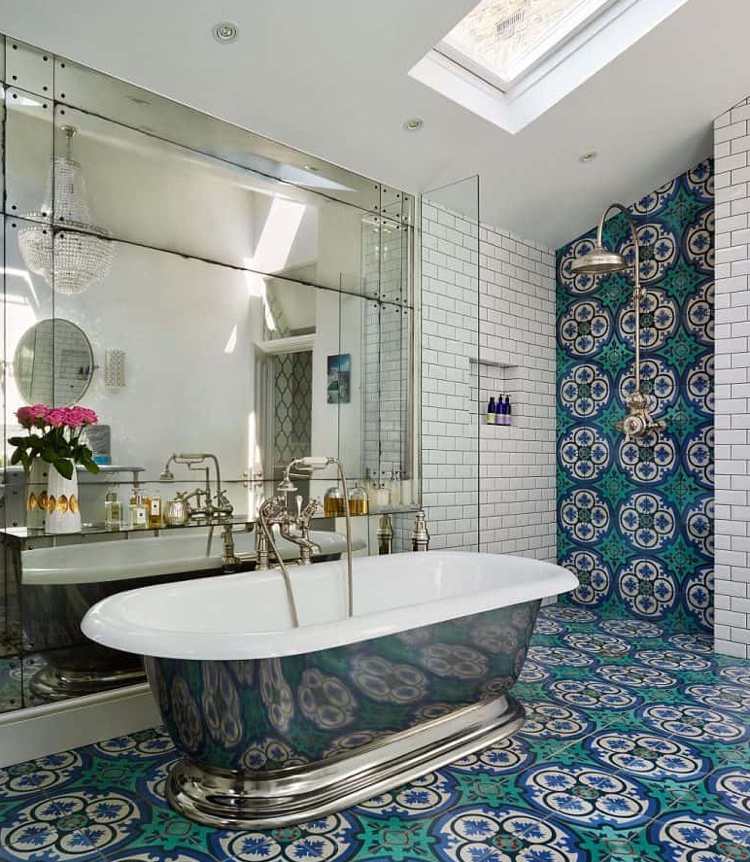 Modern Spanish-style bathroom with shower zone and free-standing bathtub and mirror and tiles