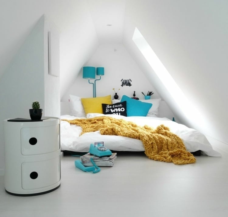 Design sleeping alcoves on the loft under a sloping roof