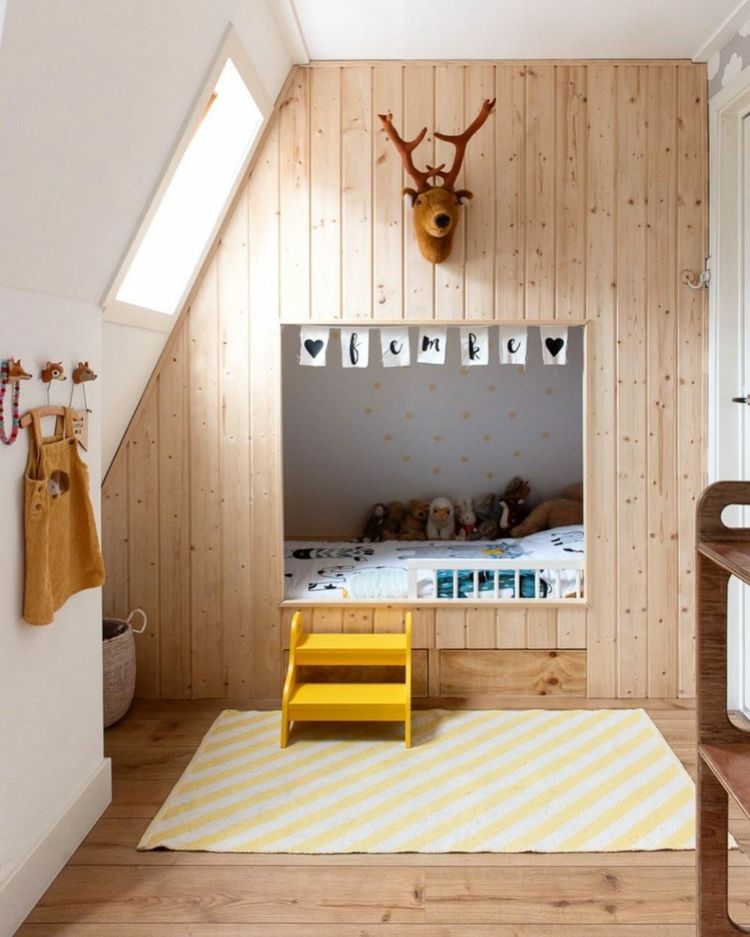 Design a sleeping alcove in the children's room with a wooden wall and a small staircase