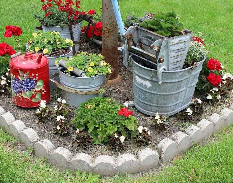 Create a vintage flower bed with tin cans and buckets