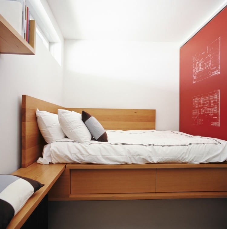 Use the wall niche for the bed and design a wooden accent wall
