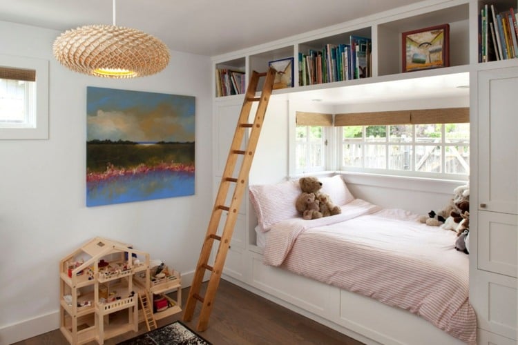 Living idea for the children's room - install the bed in a niche between cupboards