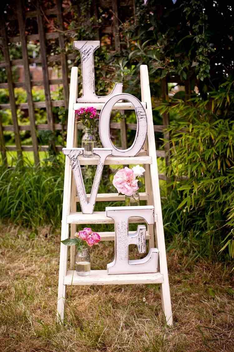 vintage decoration with ladder and letters Love in the garden