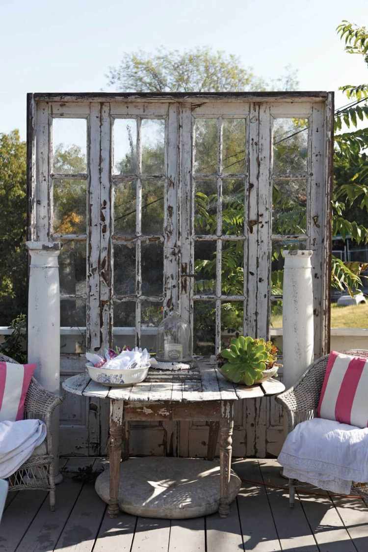 reuse of old doors as a protective screen for guests and families