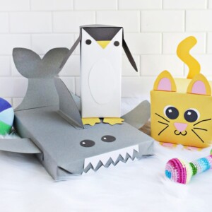 Geschenke für Kinder lustig verpacken - Ideen und Anleitungen für Katze, Pinguin und Hai