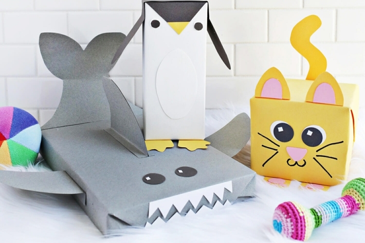 Geschenke für Kinder lustig verpacken - Ideen und Anleitungen für Katze, Pinguin und Hai