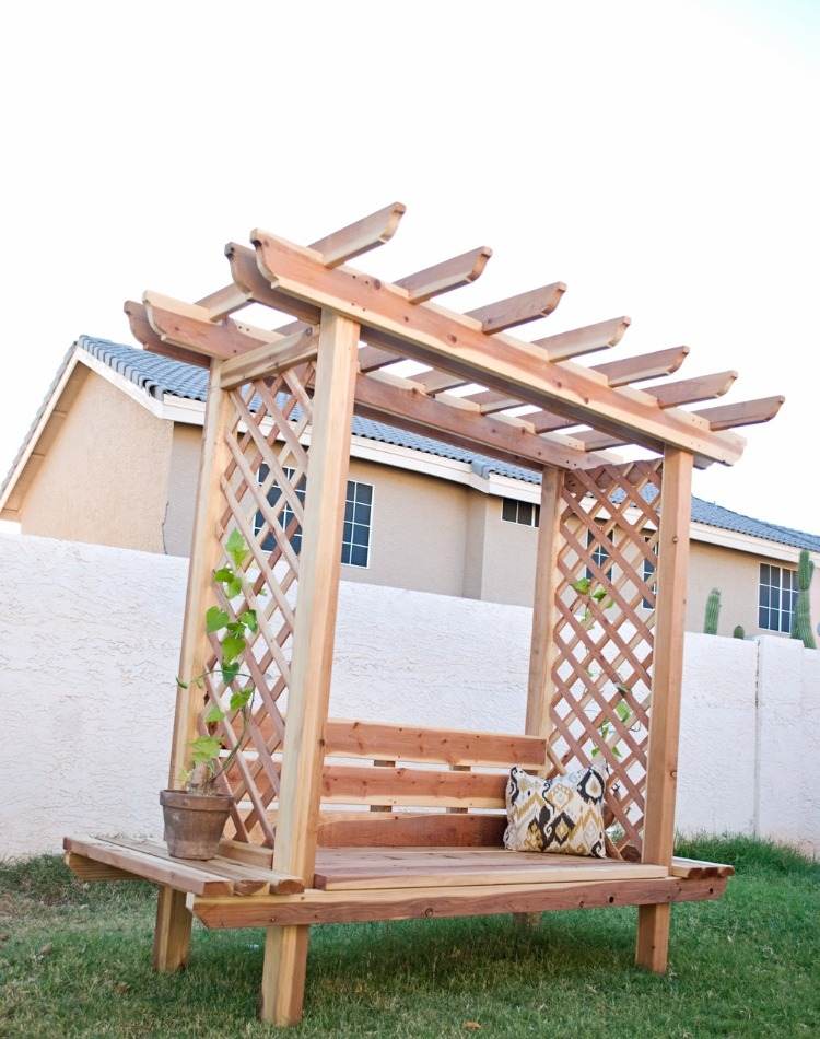 diy project for wooden garden bench with pergola gazebo with climbing plant and cushion in the back yard