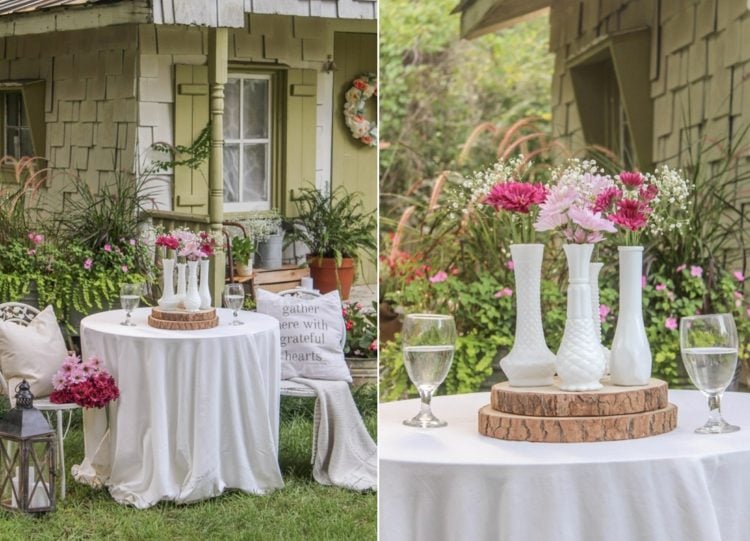 Vintage Gartentisch Deko mit weißen Vasen, Holzscheiben und rosa und pinken Blumen