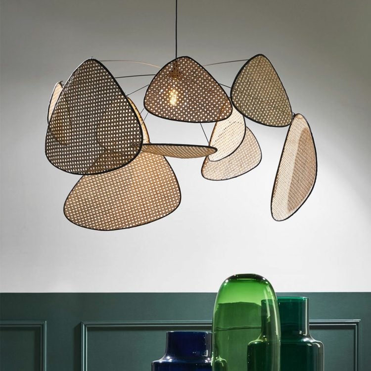 Creative pendant luminaire with organically shaped, woven elements