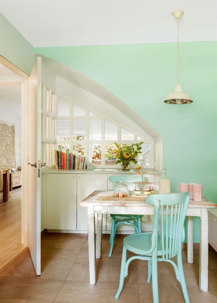 Mint color for the wall and chairs in a country kitchen
