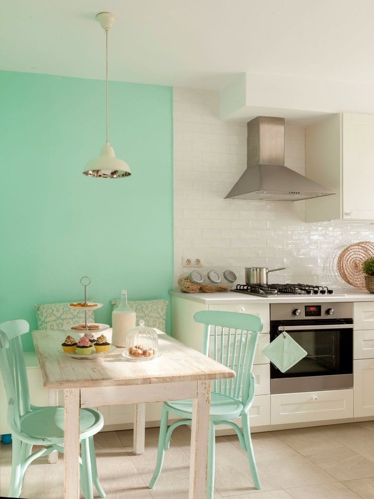 Pastel mint color on an accent wall in a country kitchen