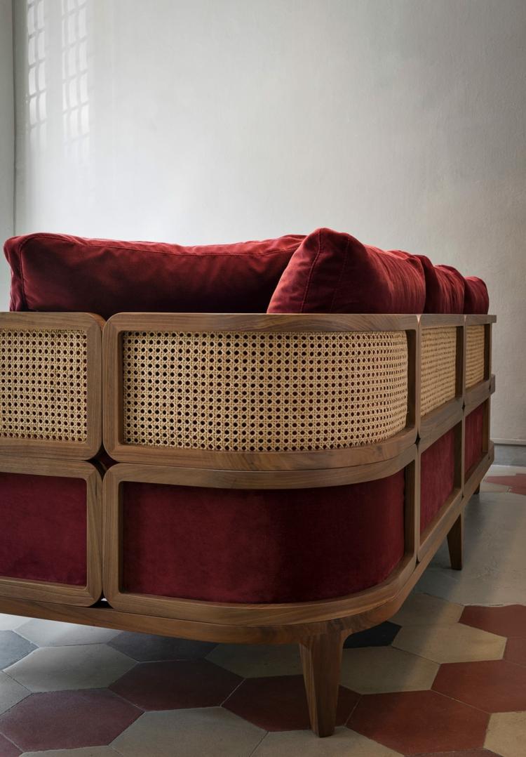 Retro furniture staged in a modern way with octagonal wickerwork and velvet in Bordeaux