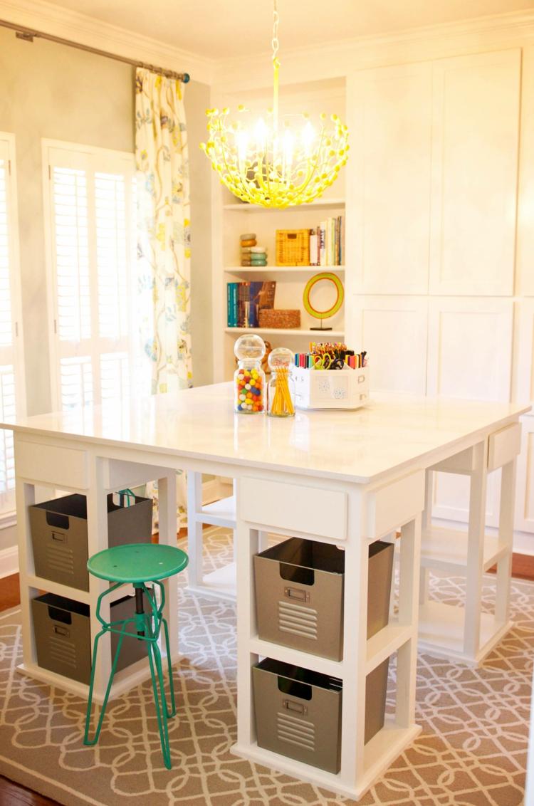 Use a self-made kitchen island as a desk with integrated shelves for boxes