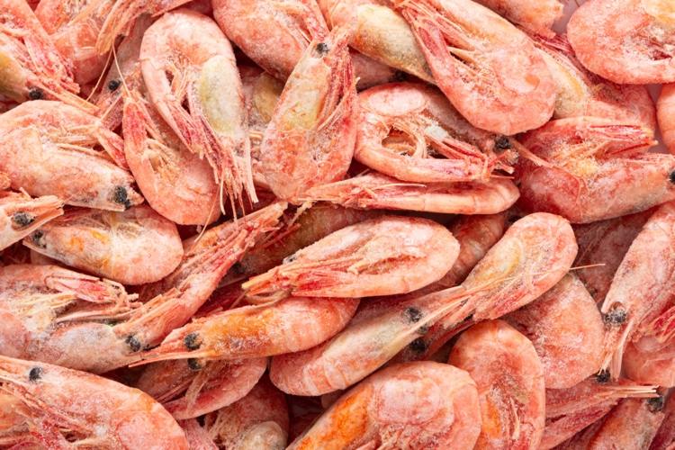Traces of the virus were found on frozen shrimp and chicken wing packs