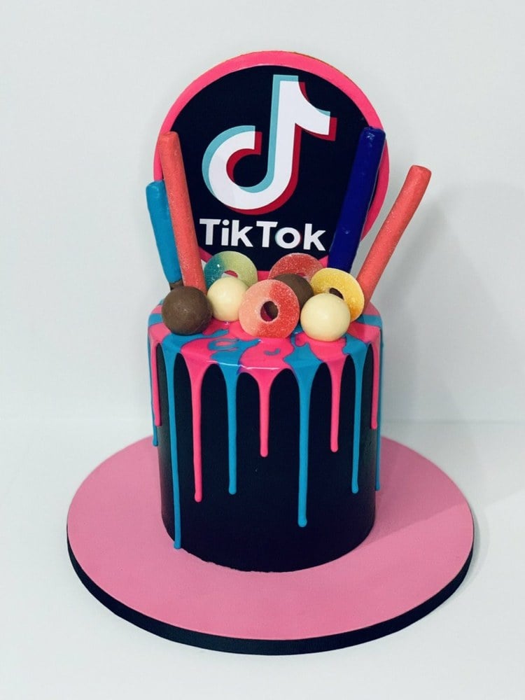 Decorate tik tok cake with fondant and sweets