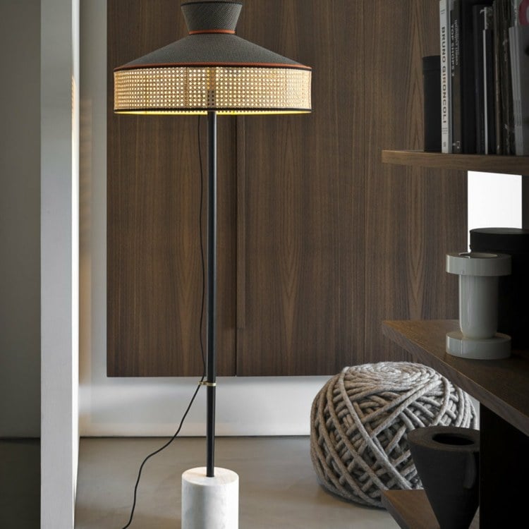 Viennese braid decorates the lampshade of a floor lamp