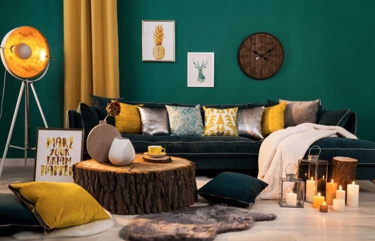 dark green wall of living room as an eye-catcher combined with yellow