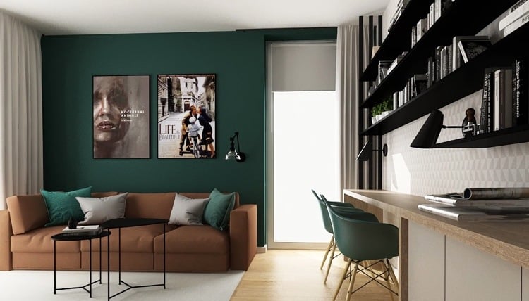 dunkelgrüne wand wohnzimmer mit braunem sofa und schwarzen elementen kombiniert