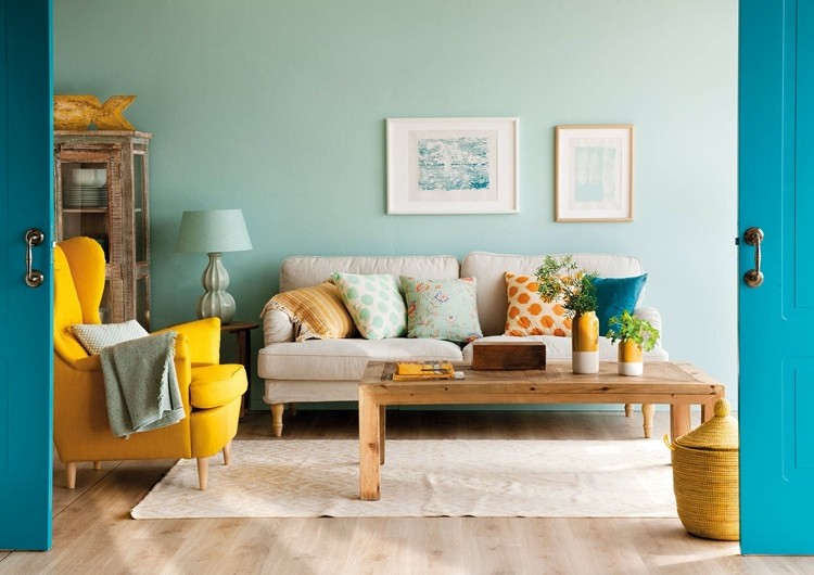mint color wall in the living room combined with yellow and cream