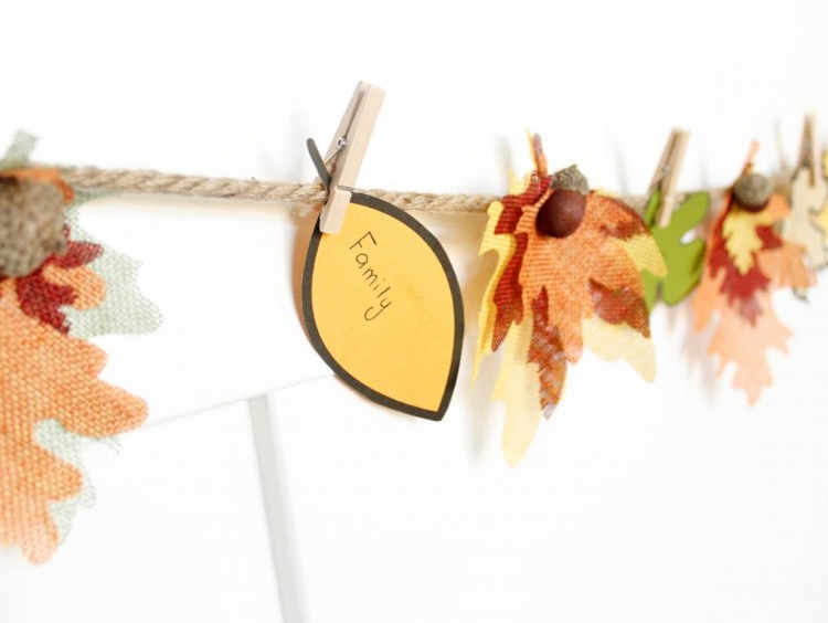 Autumn garland made of fabric with children making instructions