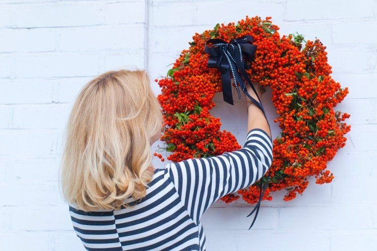 Autumn wreath with orange rowan berries