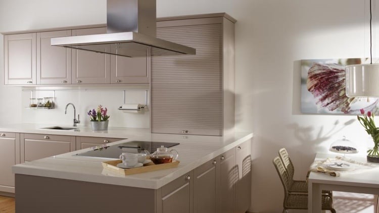 Cabinet roller shutter system in beige for modern kitchens with country house flair