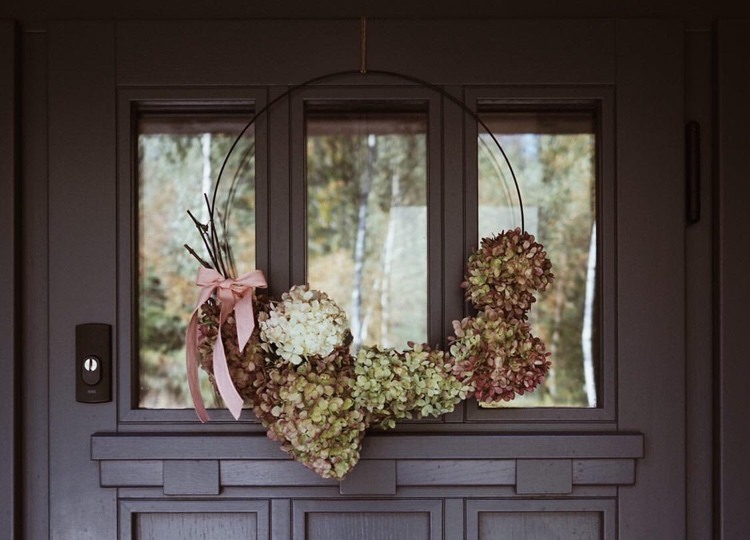 elegant door wreath for autumn with hydrangeas