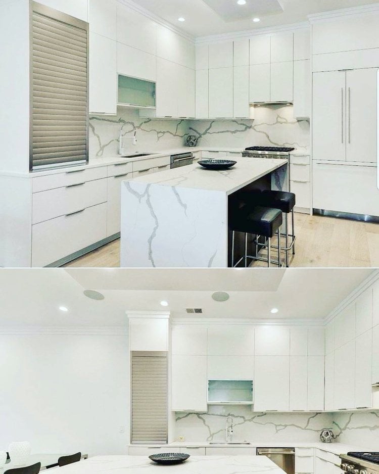 white kitchen with marble island and rear wall with aluminum roller shutter cabinet