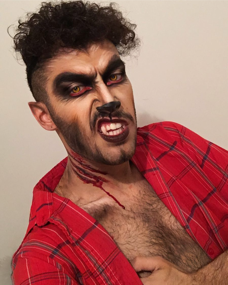 mann mit bart und make up für halloween, wie ein furchterregendes tier