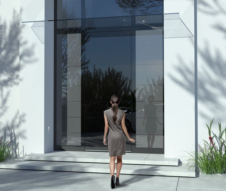 Moderne Haustür aus schwarzem Glas raumhoch flächenbündig