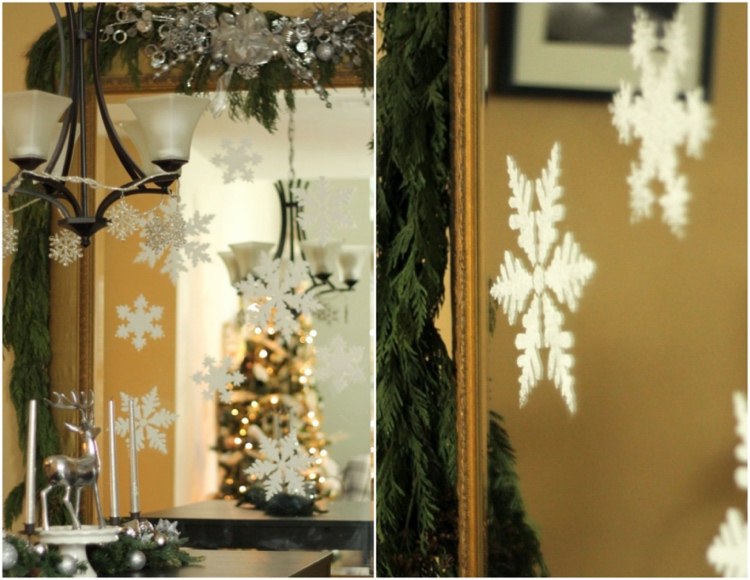 Spiegel für den Winter dekorieren mit Schneeflocken, Tannenzweigen und silbernen Dekorationen