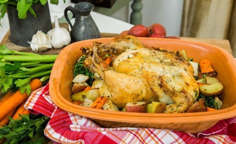 A recipe for roasting a whole chicken in a Roman pot