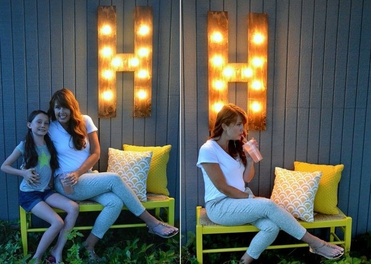 Terrassenwand Deko selber machen - Buchstabe aus Holz mit Lichterkette als Beleuchtung