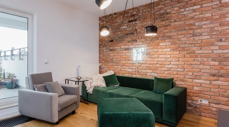 industrial wohnzimmer einrichten grünes sofa