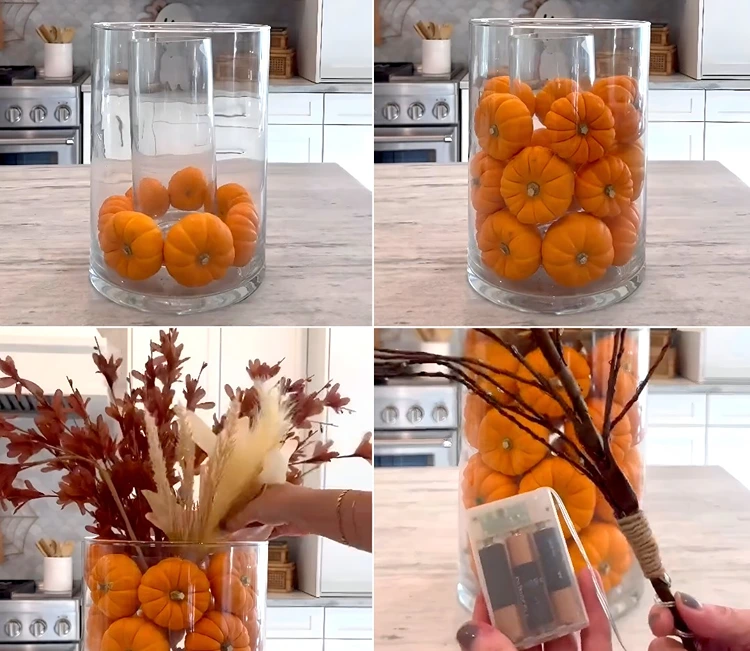 Kleines Glas in größeres stellen und Zwischenraum mit Zierkürbissen füllen