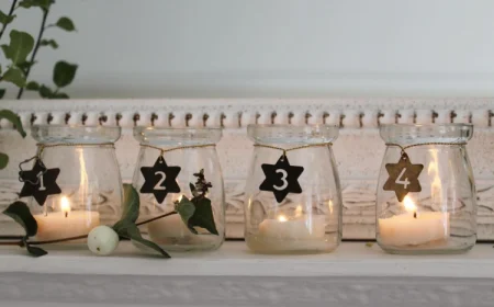 adventskranz mit teelichtern in glass