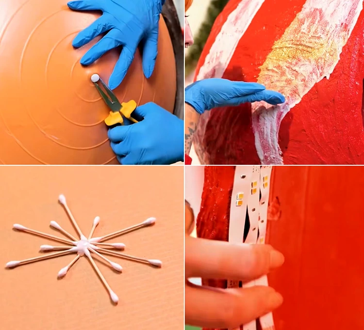 Kugel bemalen und mit Schneeflocken aus Ohrenstäbchen verzieren