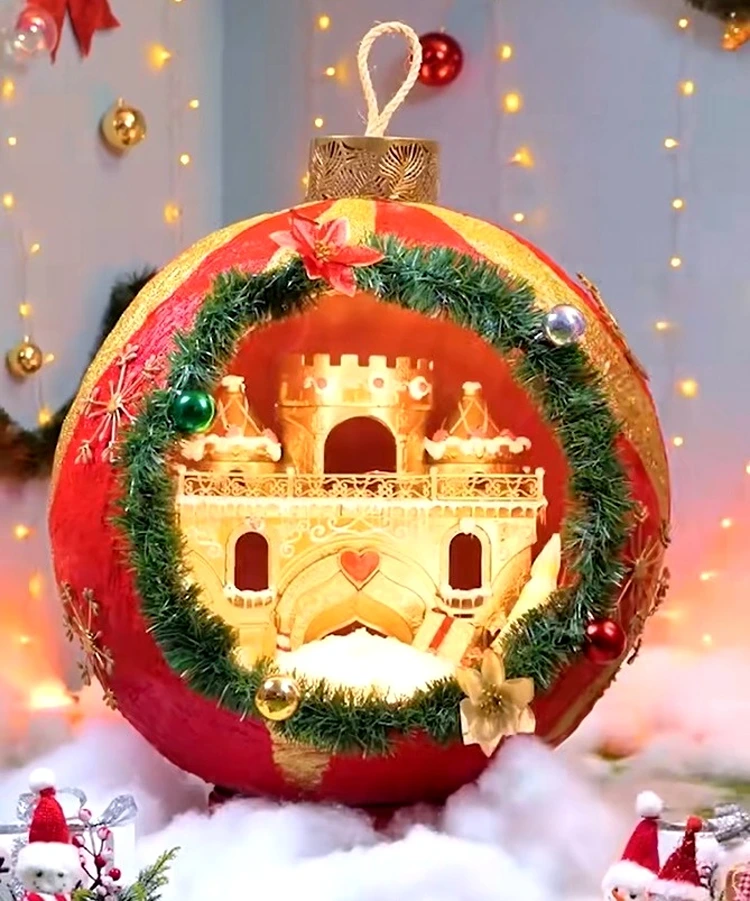 Leuchtende Gartendeko für Weihnachten mit romantischer Szene