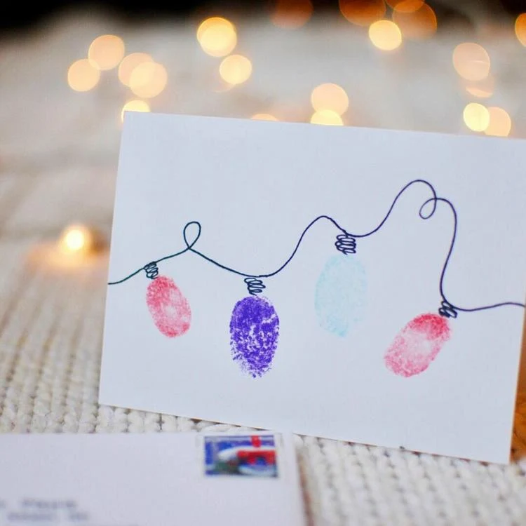 Schöne Weihnachtskarte mit Fingerabdrücken basteln und verschicken