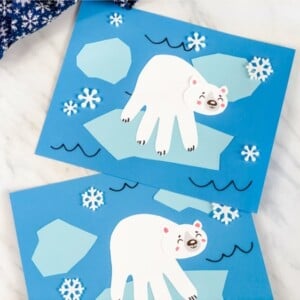 Eisbär basteln aus Papier mit Handabdruck von Kindern