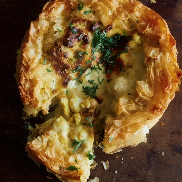 Cauliflower pie with curry and potatoes in filo pastry