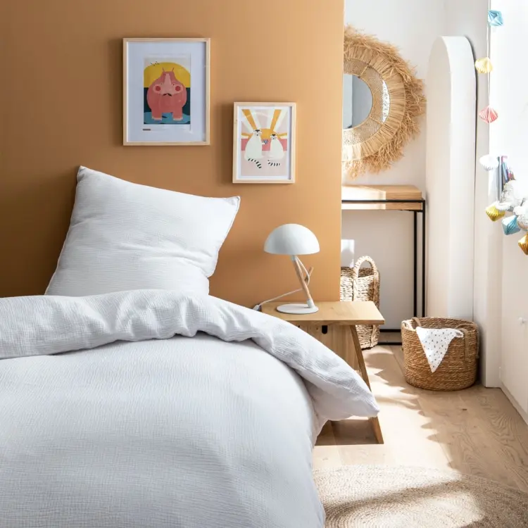 Orange als Wandfarbe fürs kleine Schlafzimmer