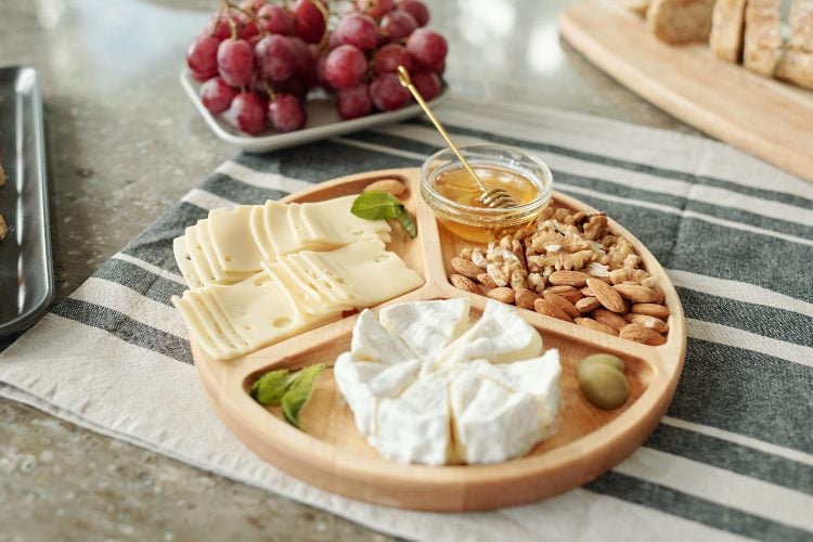 Cheese, nuts and honey for breakfast