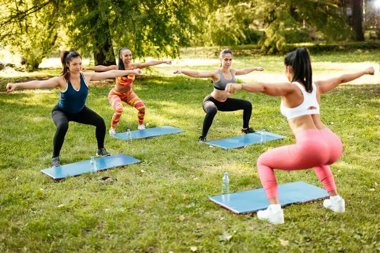 Strength training with squats in the park: outdoor training