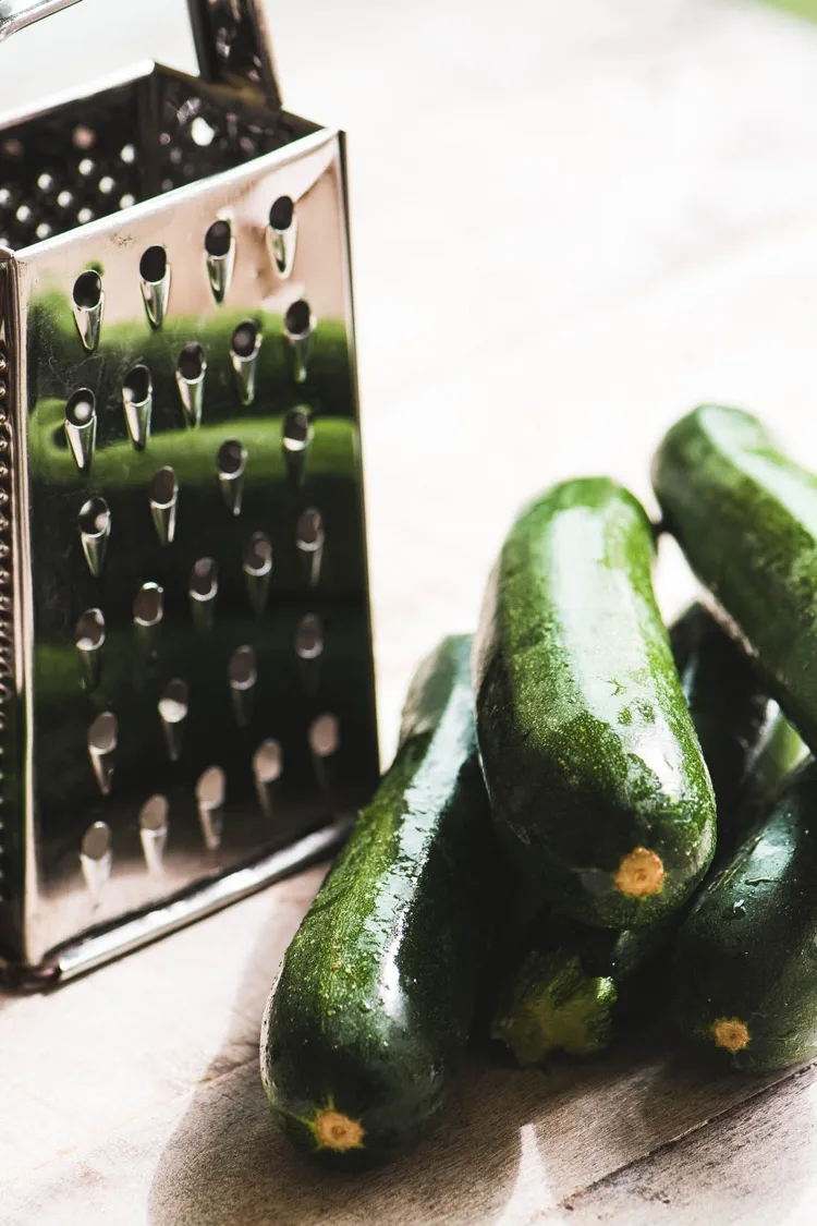 Process zucchini for cakes kitchen grater