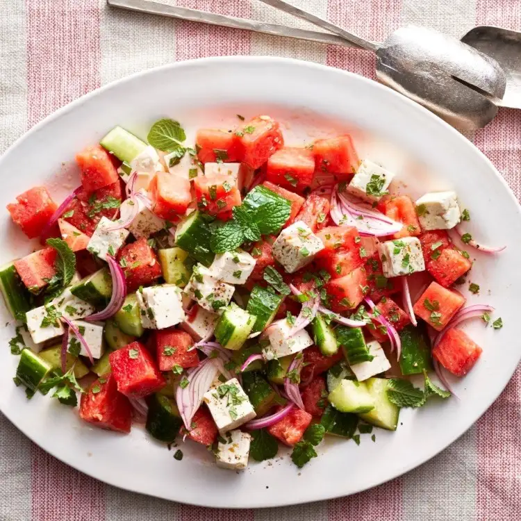 Salad with cucumber, watermelon and feta cheese for the summer