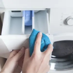 Waschmittelfach reinigen Toplader abwischen nützliche Tipps