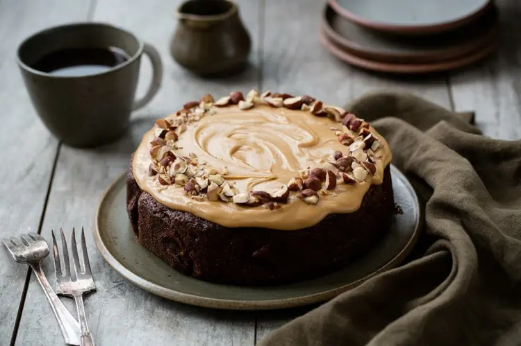 Bake hazelnut cake with coffee, cocoa and frosting