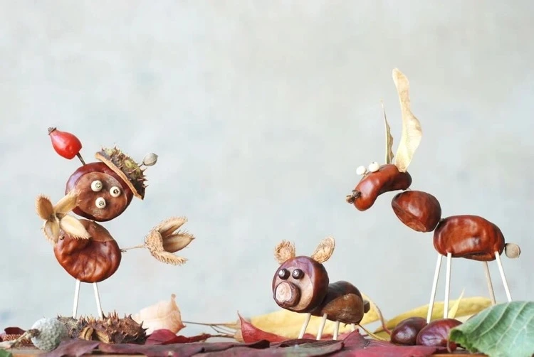 Lustige Figuren aus Kastanien basteln Ideen für Kinder