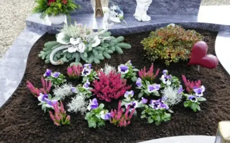 Pflegeleichte Grabbepflanzung für den Winter - Blumen und immergrüne Gehölze